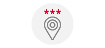 Icono de ubicación con un marcador tipo objetivo y tres asteriscos rojos encima